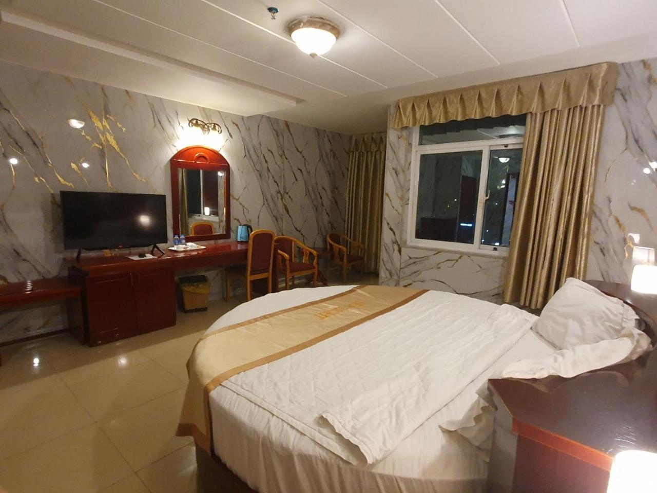 Phòng Deluxe Giường Đôi Nhìn Ra Biển Từ Phía Bên Cạnh